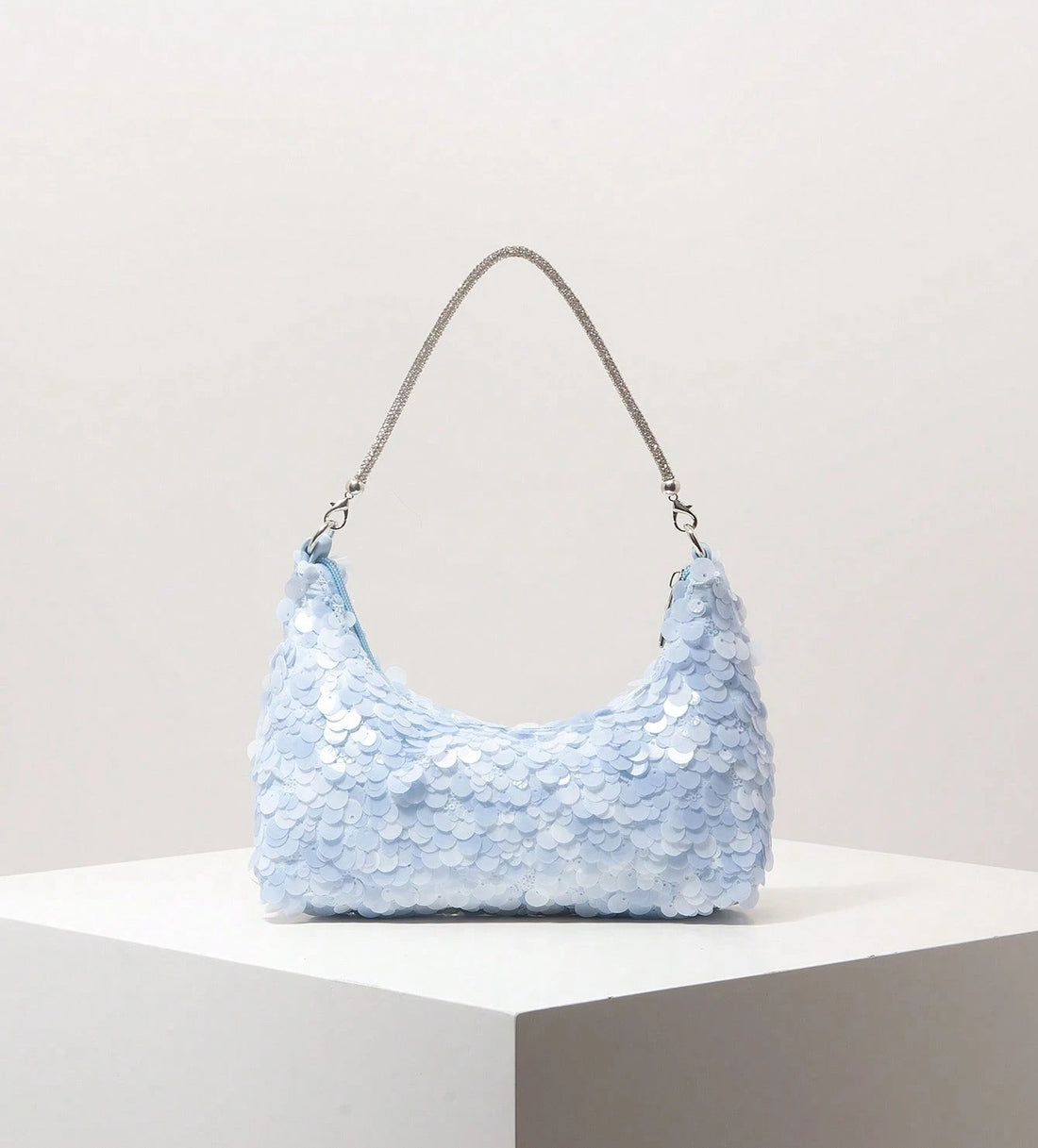 Bolso de lentejuelas en celeste