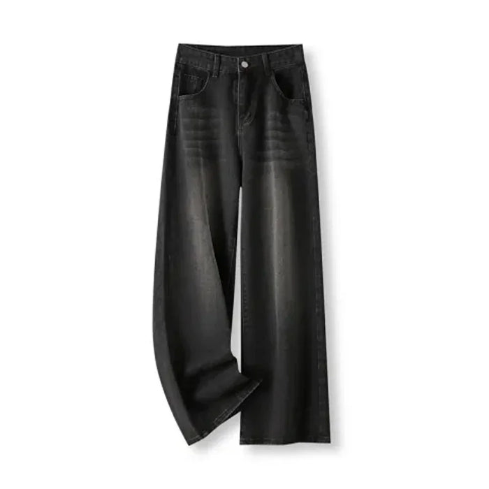 Vaqueros baggy wide leg en negro lavado, colocados en plano sobre fondo blanco