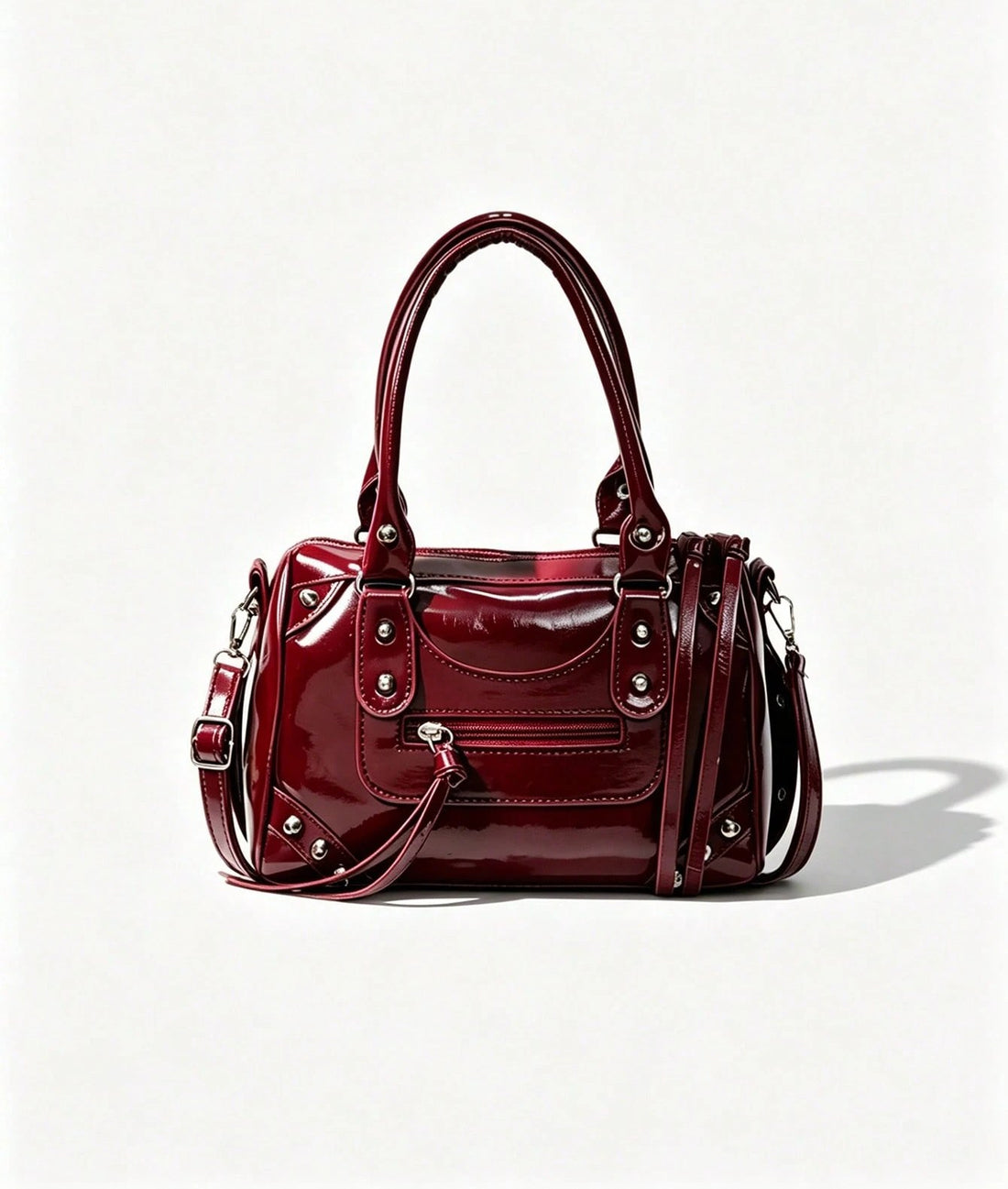 Bolso bowling con tachuelas en burdeos