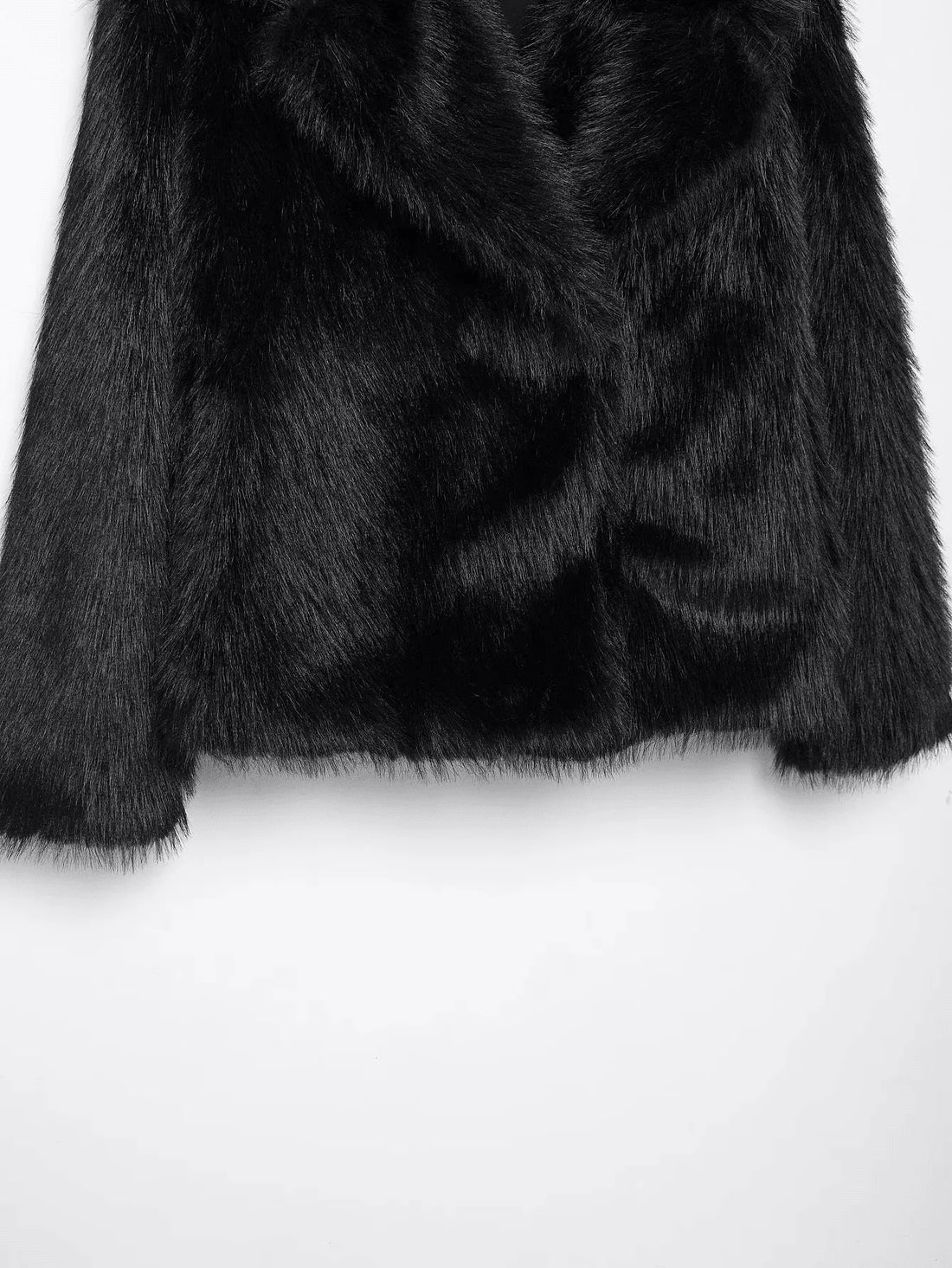 Chaqueta de pelo sintético en negro