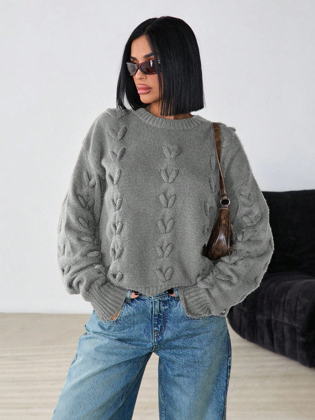 Jersey de punto trenzado en gris claro