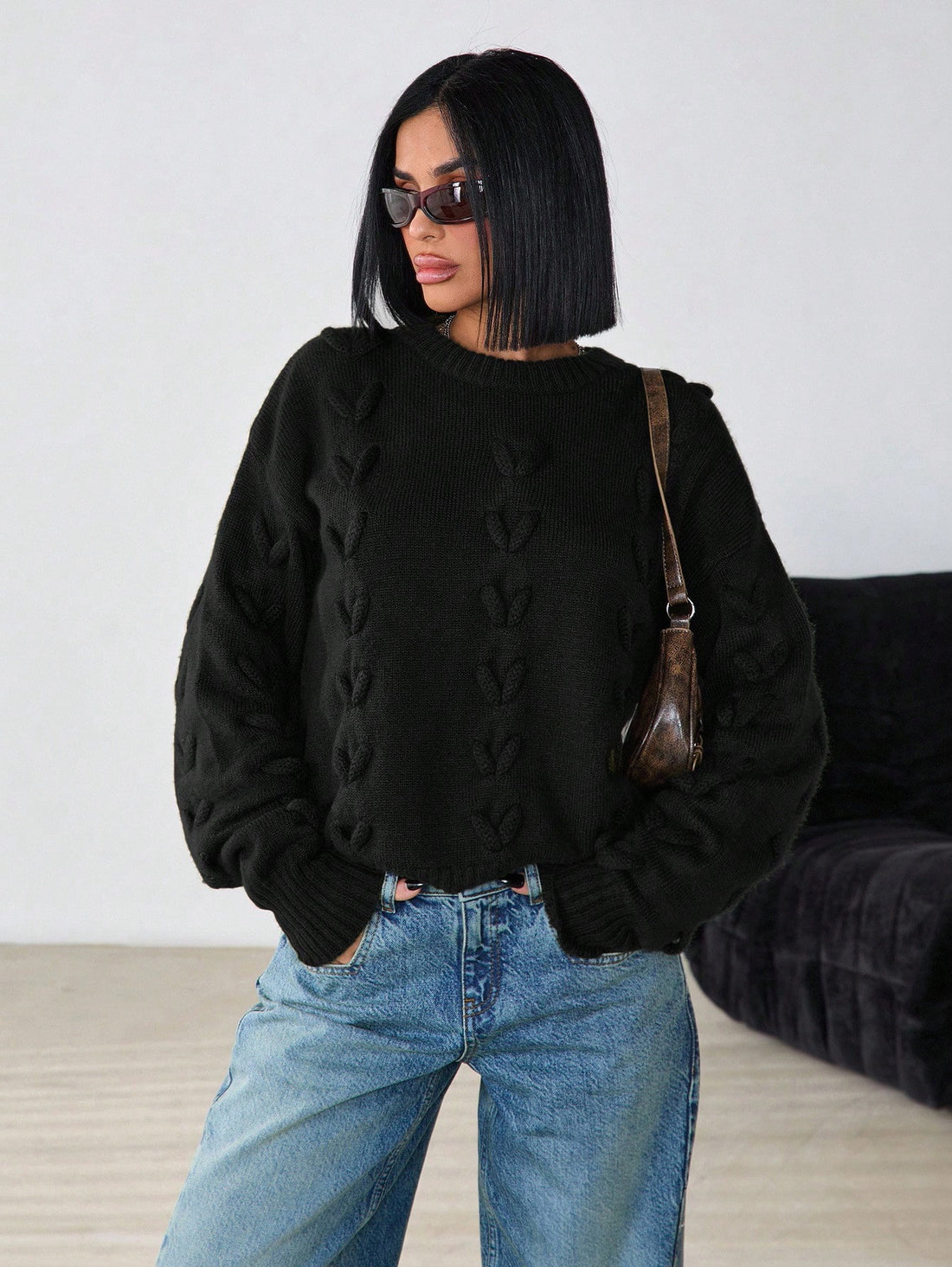 Jersey de punto trenzado en negro
