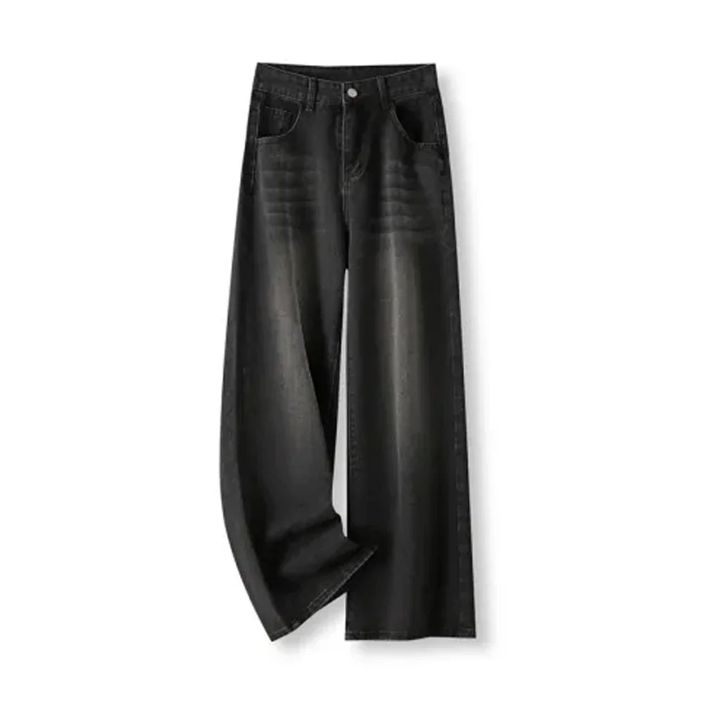 Vaqueros baggy wide leg en negro lavado, colocados en plano sobre fondo blanco