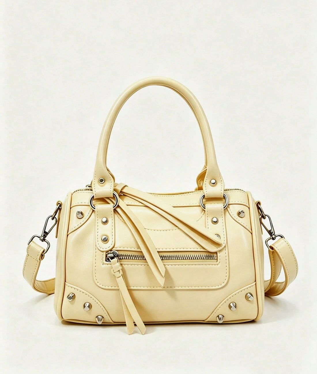 Bolso bowling con tachuelas en amarillo